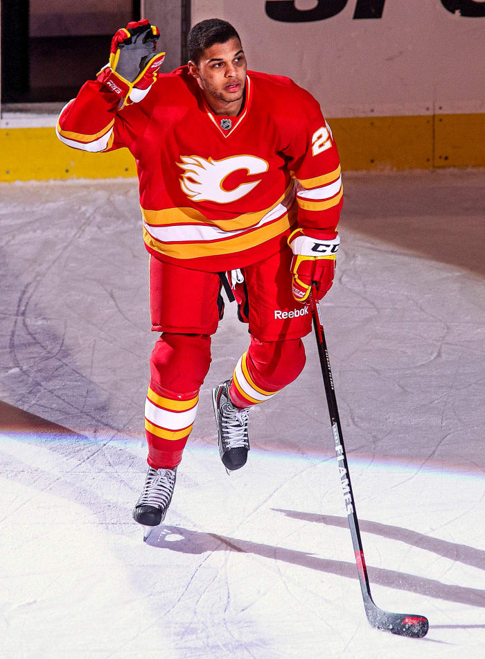 Aliu had two goals and an assist in his first two games for Calgary—but had to play without his Afro, which he shaved off to avoid standing out.